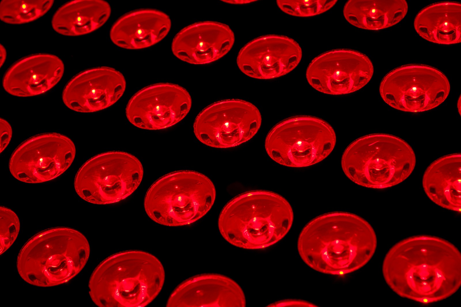 Close-up of glowing red therapeutic LED diodes